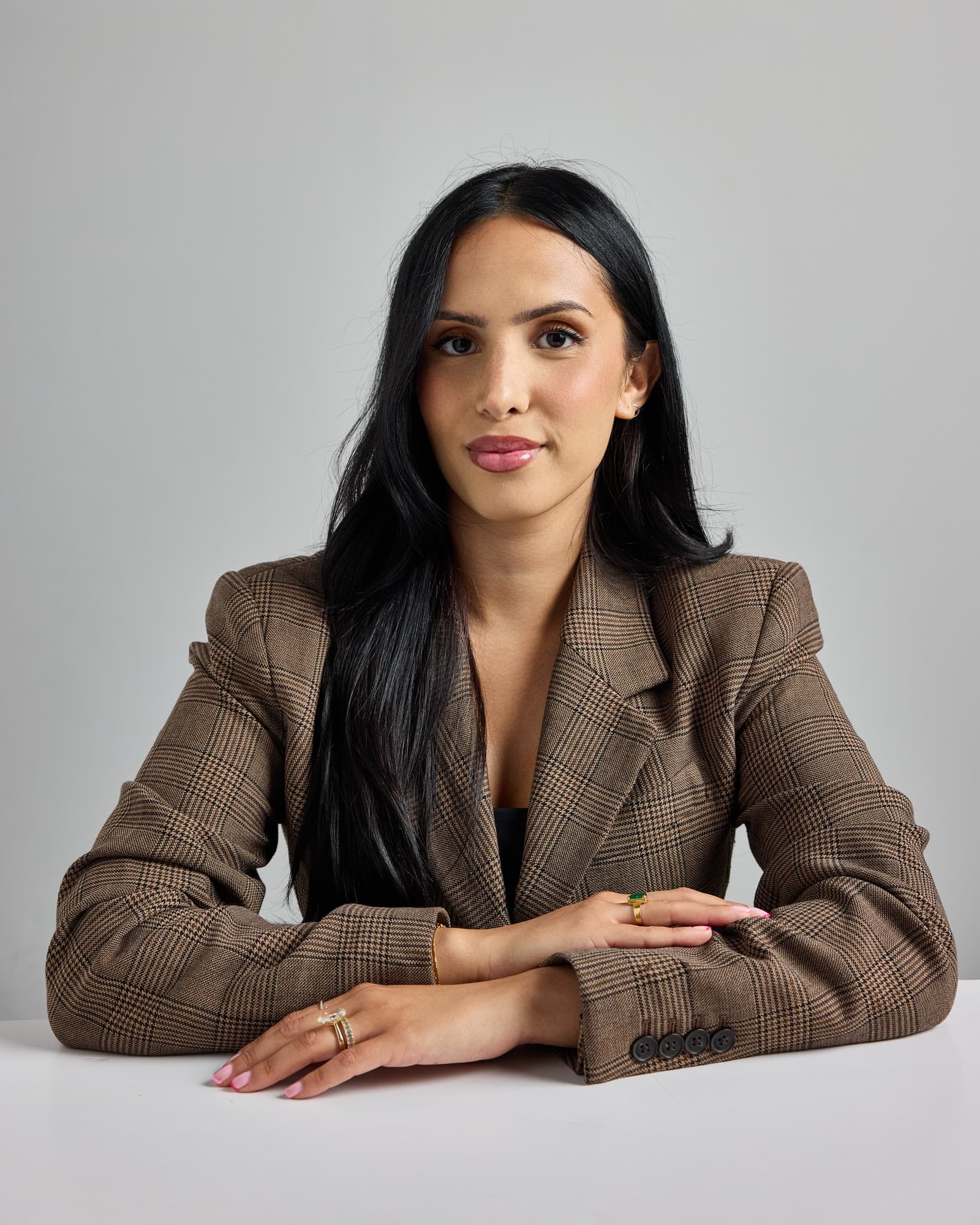 Portrait of Nayab Hassan, Co-Founder & Partner